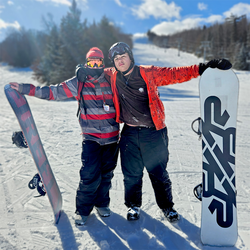 photo of snowboarders