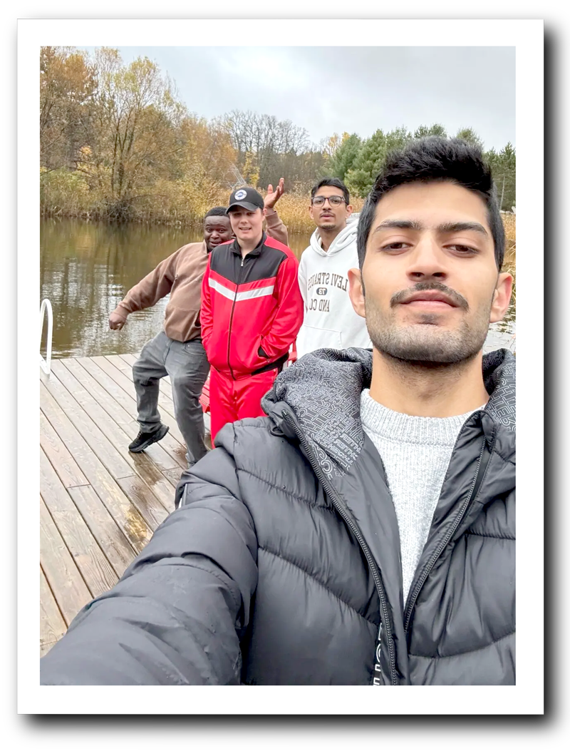 Photo of staff with Imagine member on dock